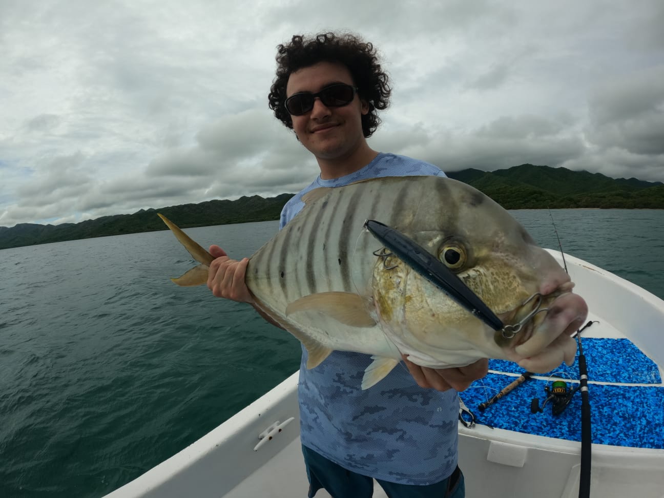 Angler with jack crevalle on sport fishing charter Guanacaste Costa Rica