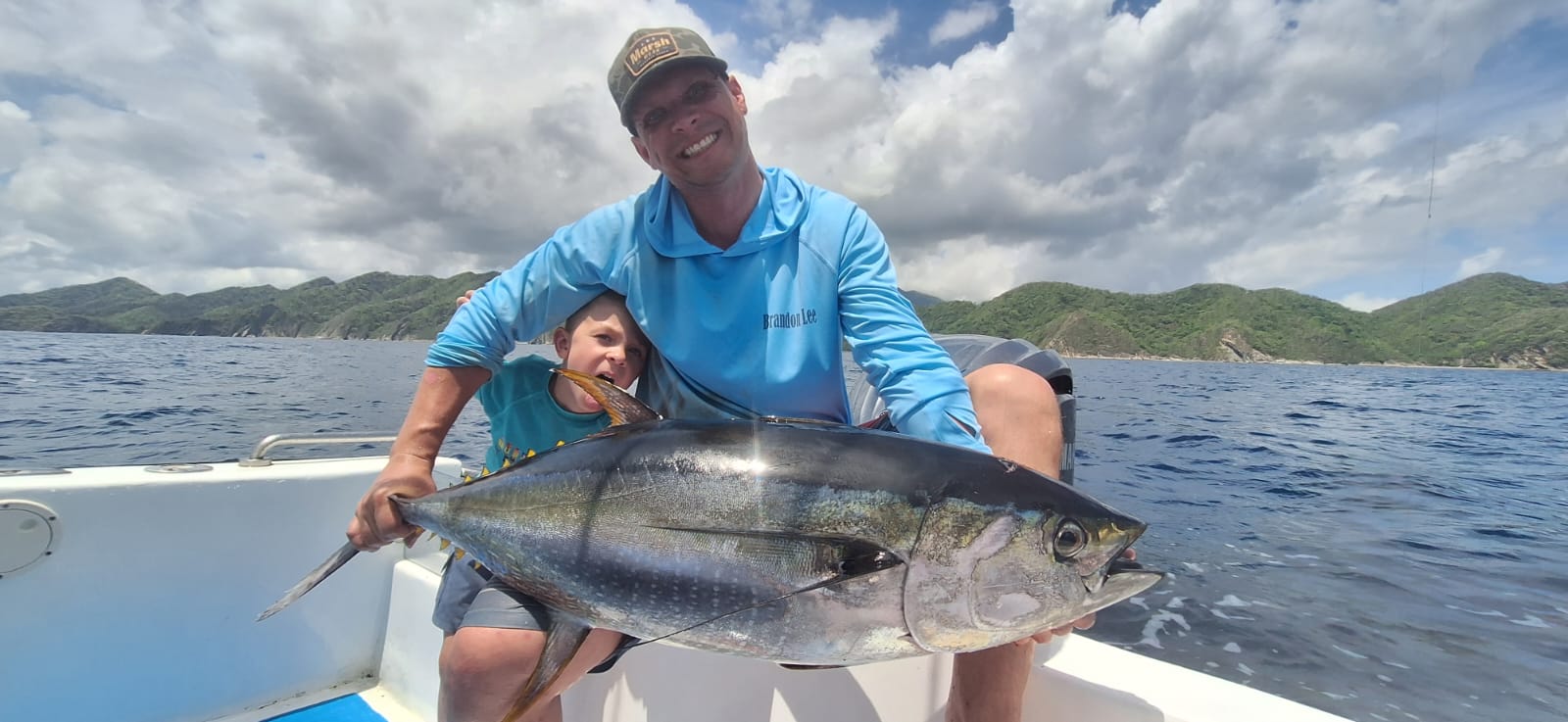Father and daughter with yellowfin tuna on charter boat Guanacaste Costa Rica