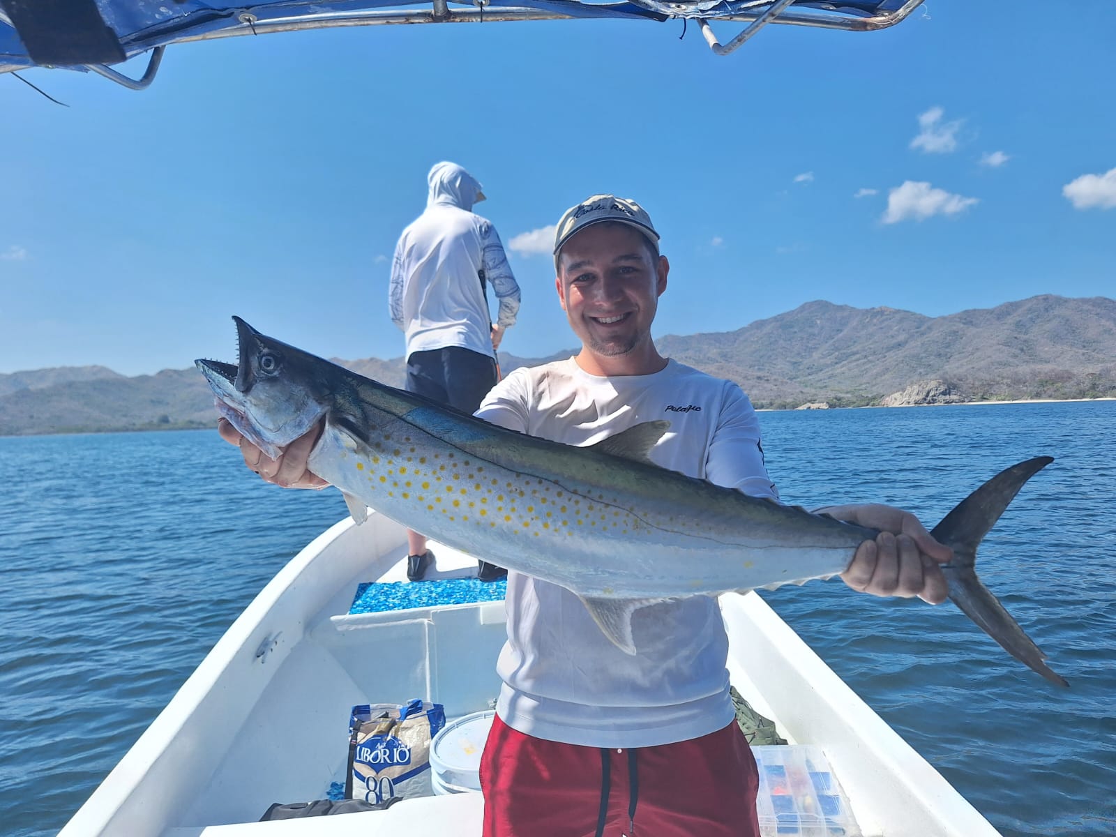 Client with Spanish mackerel on fishing charter in Bahia Salinas Costa Rica